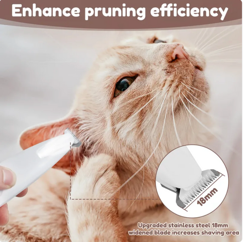 PawTec Precision Paw Trimmer trimming fur near a cat's ear, with a close-up of the stainless steel blade