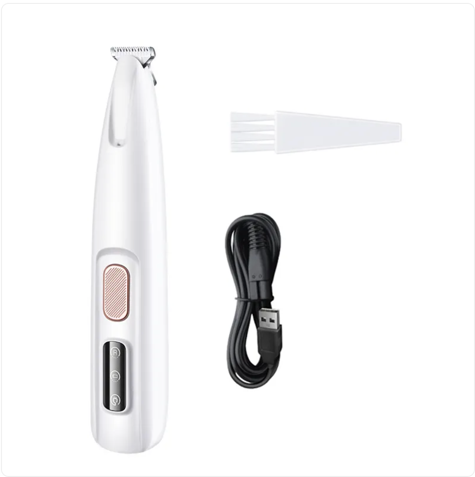 PawTec Precision Paw Trimmer with its cleaning brush and charging cable on a white background