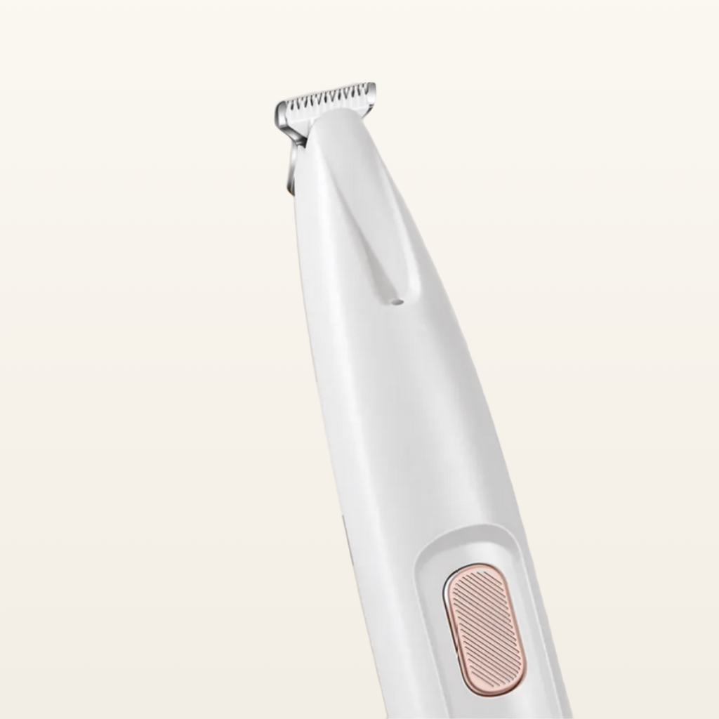 Close-up of the PawTec Precision Paw Trimmer blade head and button