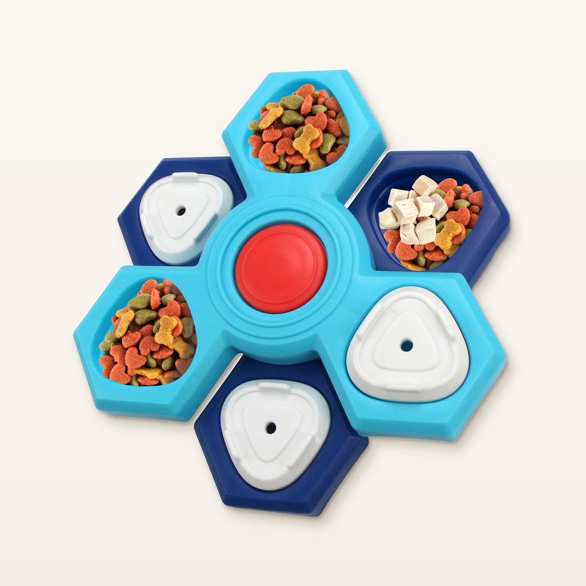 PawTec Interactive Treat Puzzle with blue hexagon compartments, kibble and a red center button